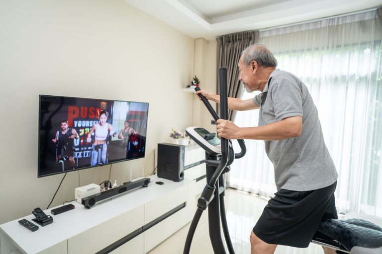 asian-senior-elderly-man-workout-cardio-on-cycling-2021-12-09-17-47-31-utc